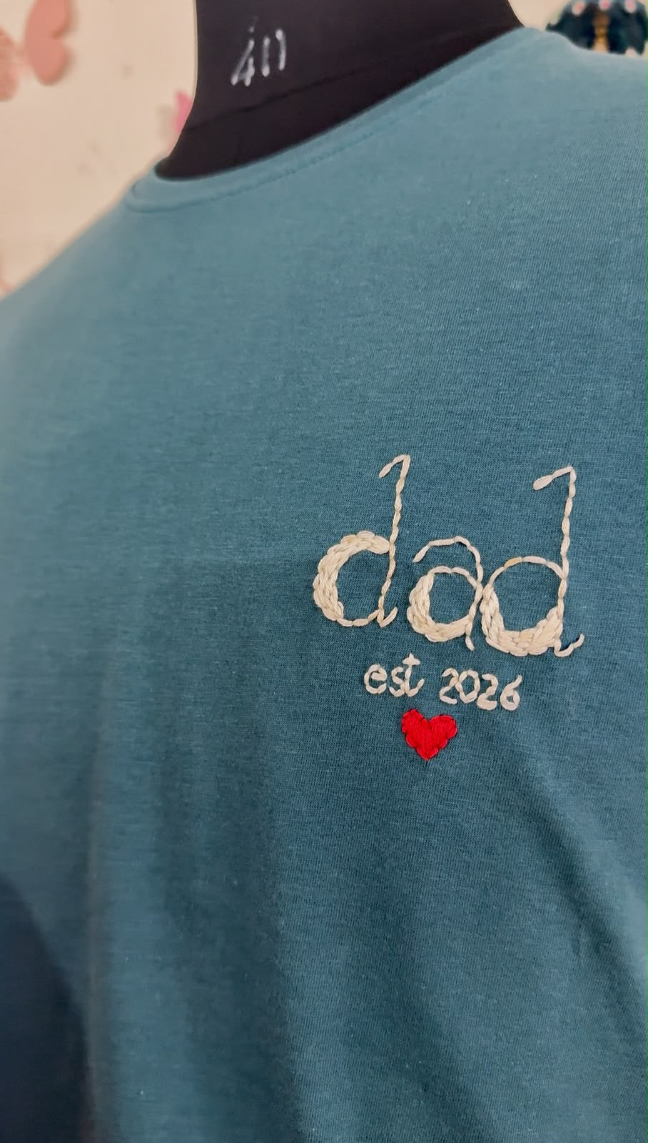 Close-up of hand embroidered heart design on Dad Tee, 220 GSM cotton